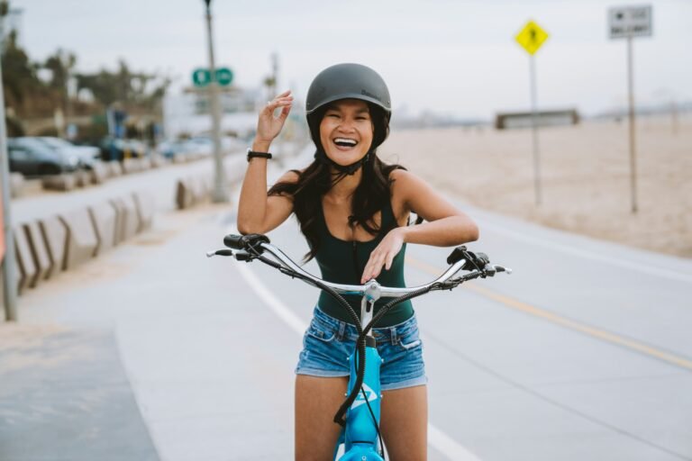 Woman happy on a bike, get your smile back